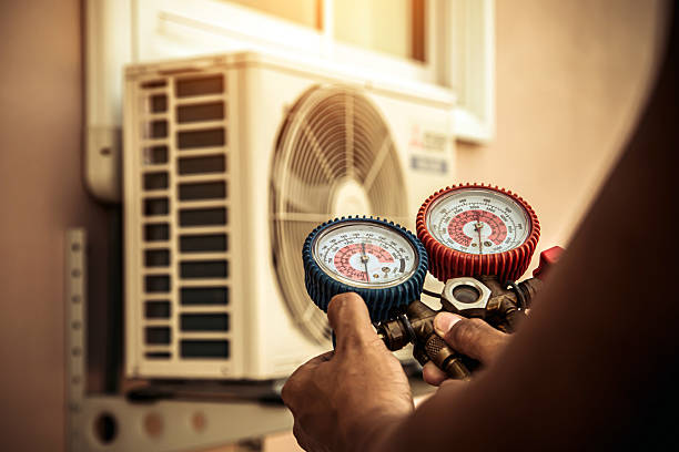 Professional Heat Pump Repair technician working in Rubicon, WI